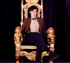 Spotify Rock Star wearing tweed on a throne